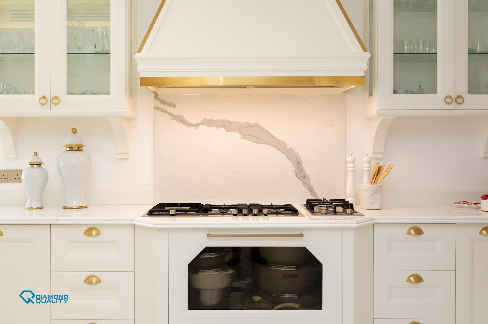 Classic modern villa kitchen with marble and gold accents in Dubai by Diamond Quality.
